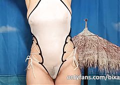 Bixanie in wet transparent swimsuit shows the nipples and the pubic hair